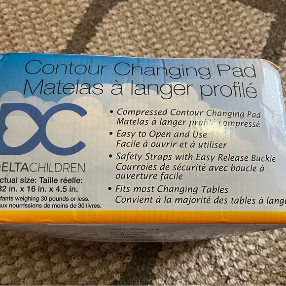 Delta Children Foam Contoured Changing Pad with Waterproof Cover - Picture 2 of 4